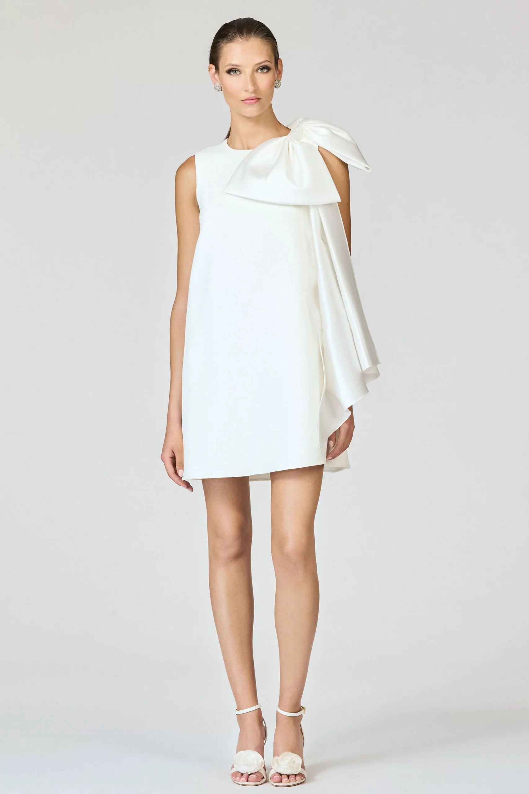short ivory reception dress for bride with bow