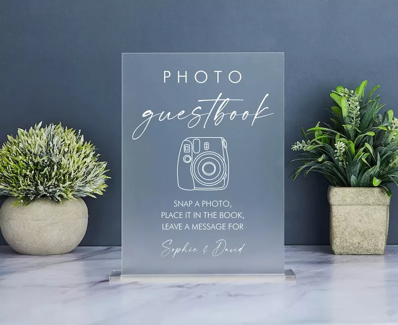 sign for instructions for guests to use wedding guest book with photos
