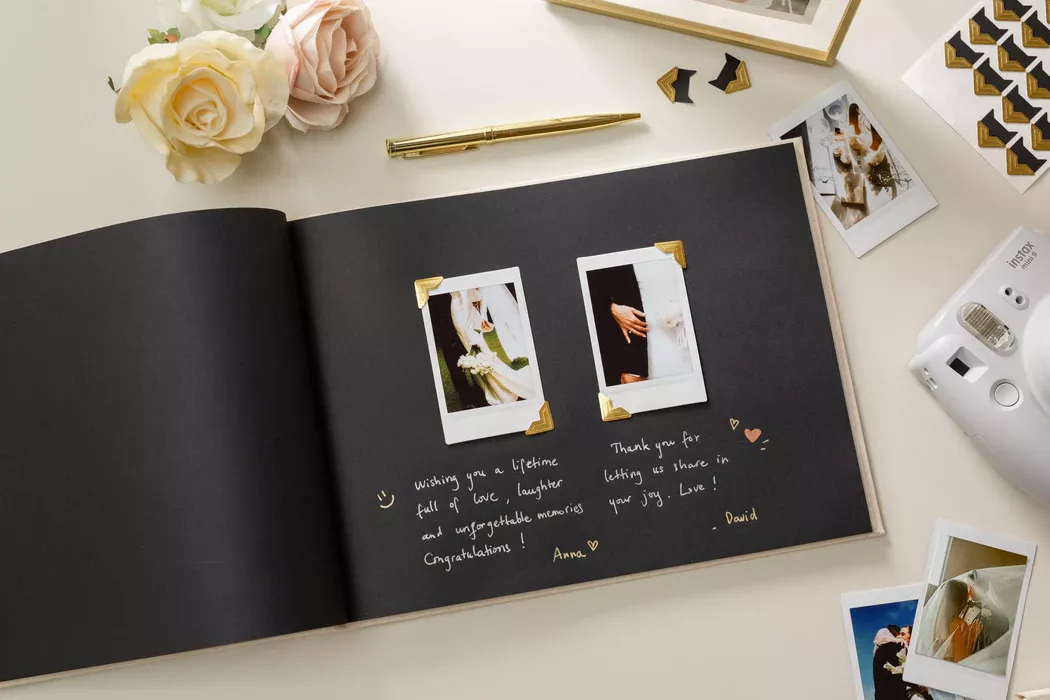 wedding photo guest book setup with camera
