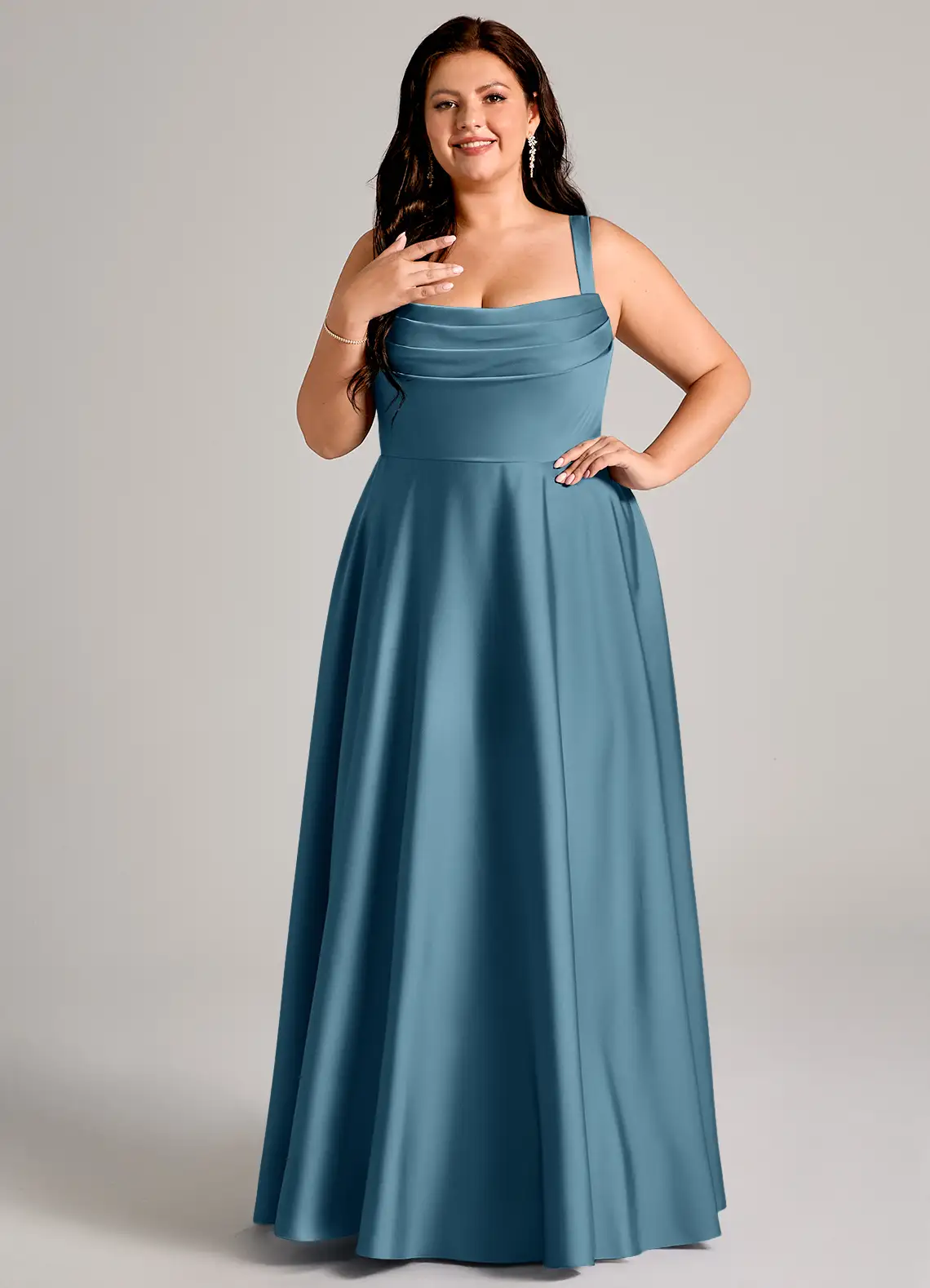 bridesmaid wearing plus size stretch satin azazie bridesmaid dresses