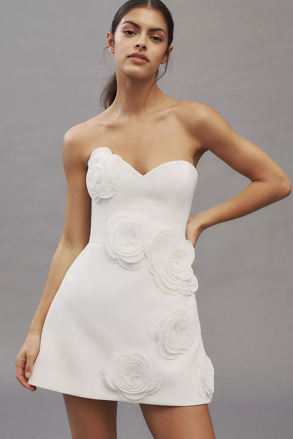 bride wearing 3D floral bridal shower dress with sweetheart neckline