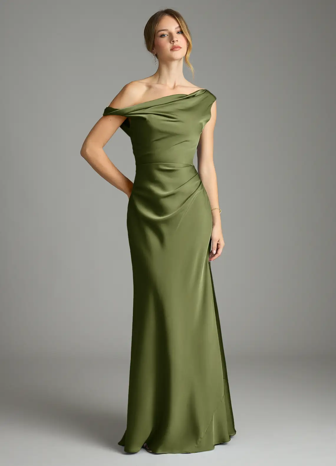 bridesmaid wearing stylish and elegant green satin maxi dress that looks expensive but is affordable