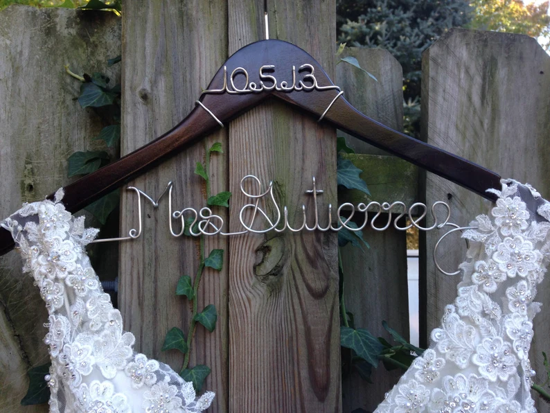 custom wedding dress hanger with dark wood and wire personalization