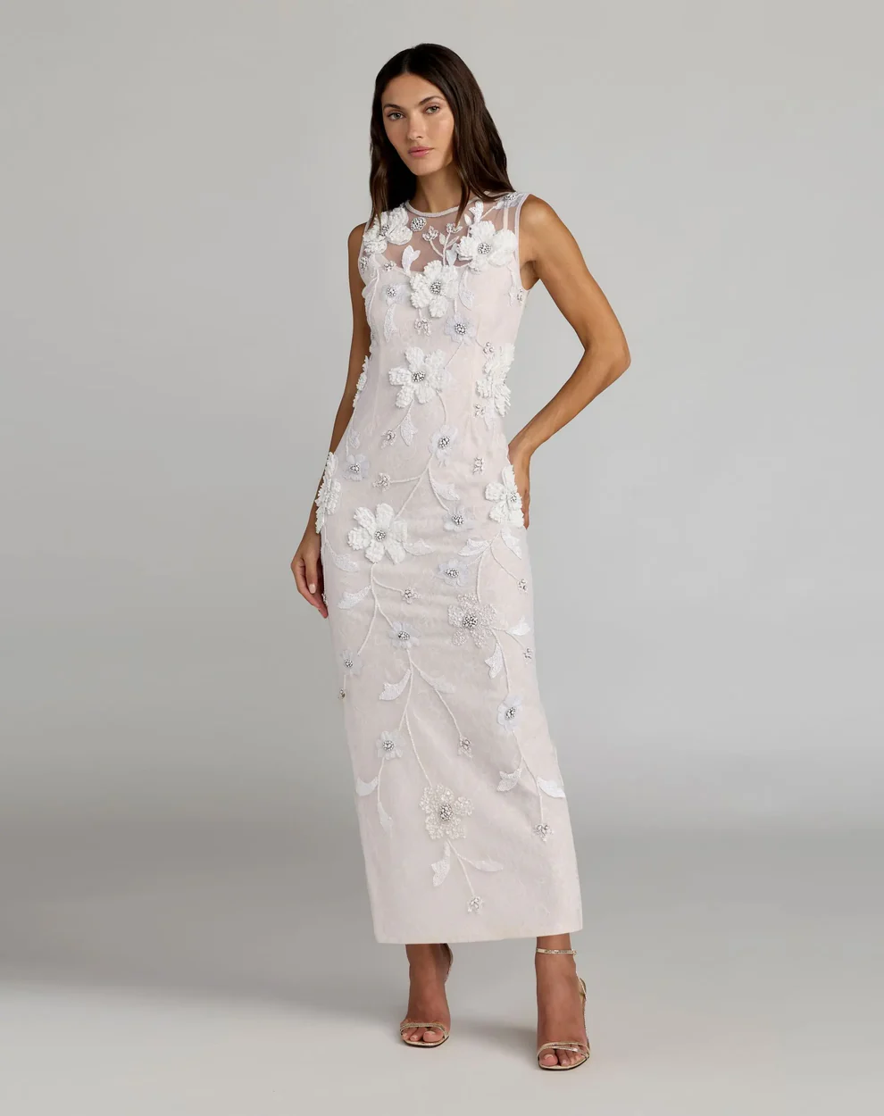 bride wearing elegant white sleeveless floral embellished column bridal shower dress