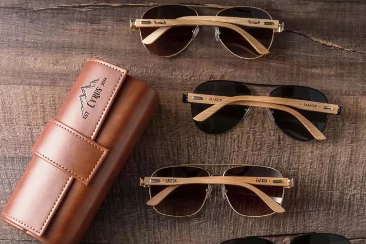 groomsmen wearing stylish sunglasses at an outdoor wedding ceremony