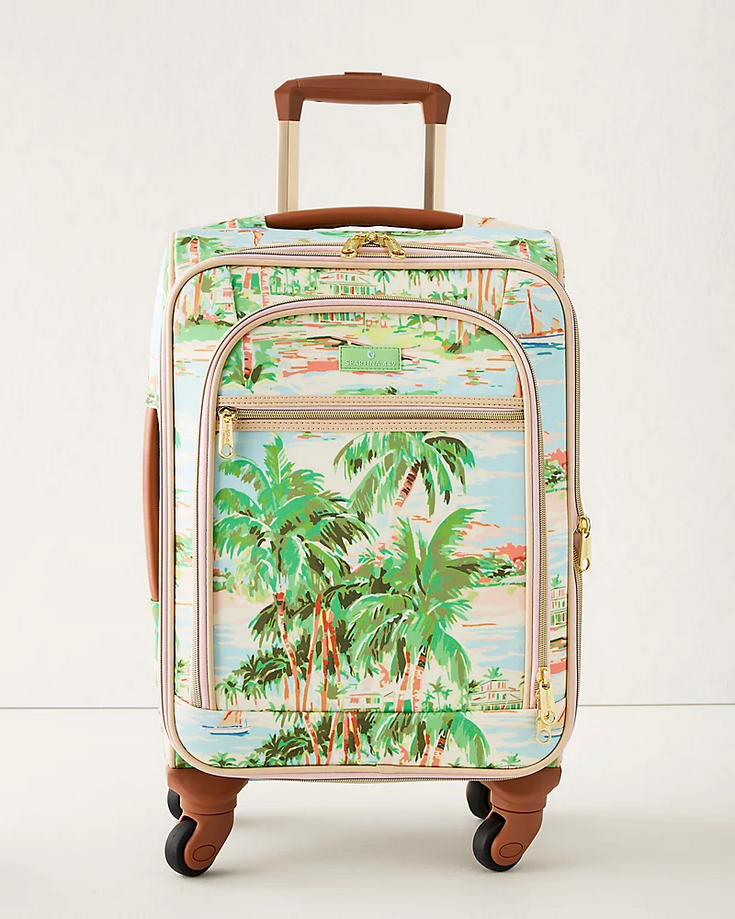 rolling suitcase with palm trees