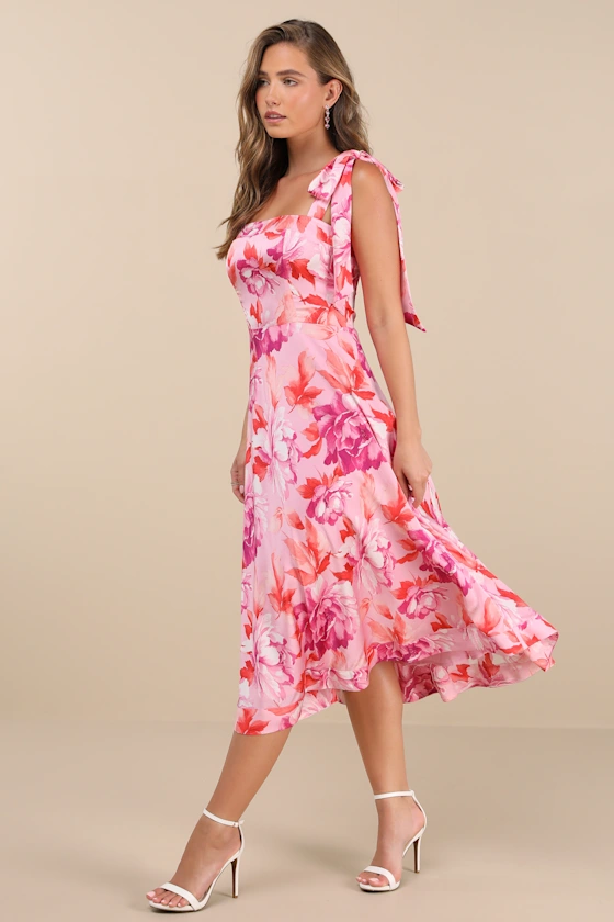 pink floral cocktail wedding guest dress with ties at shoulders