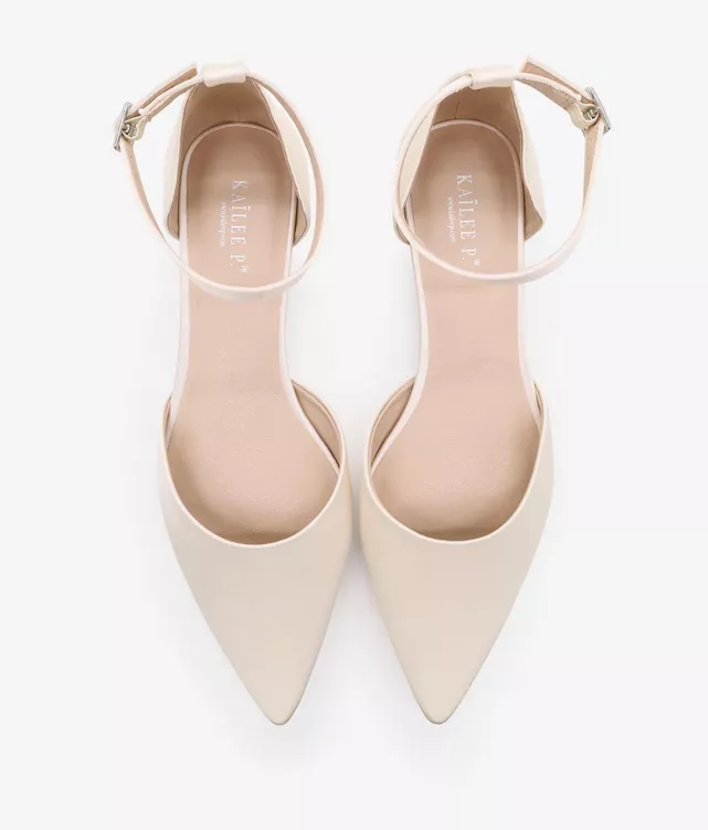 pointed toe flats for mother of the bride outdoors on grass