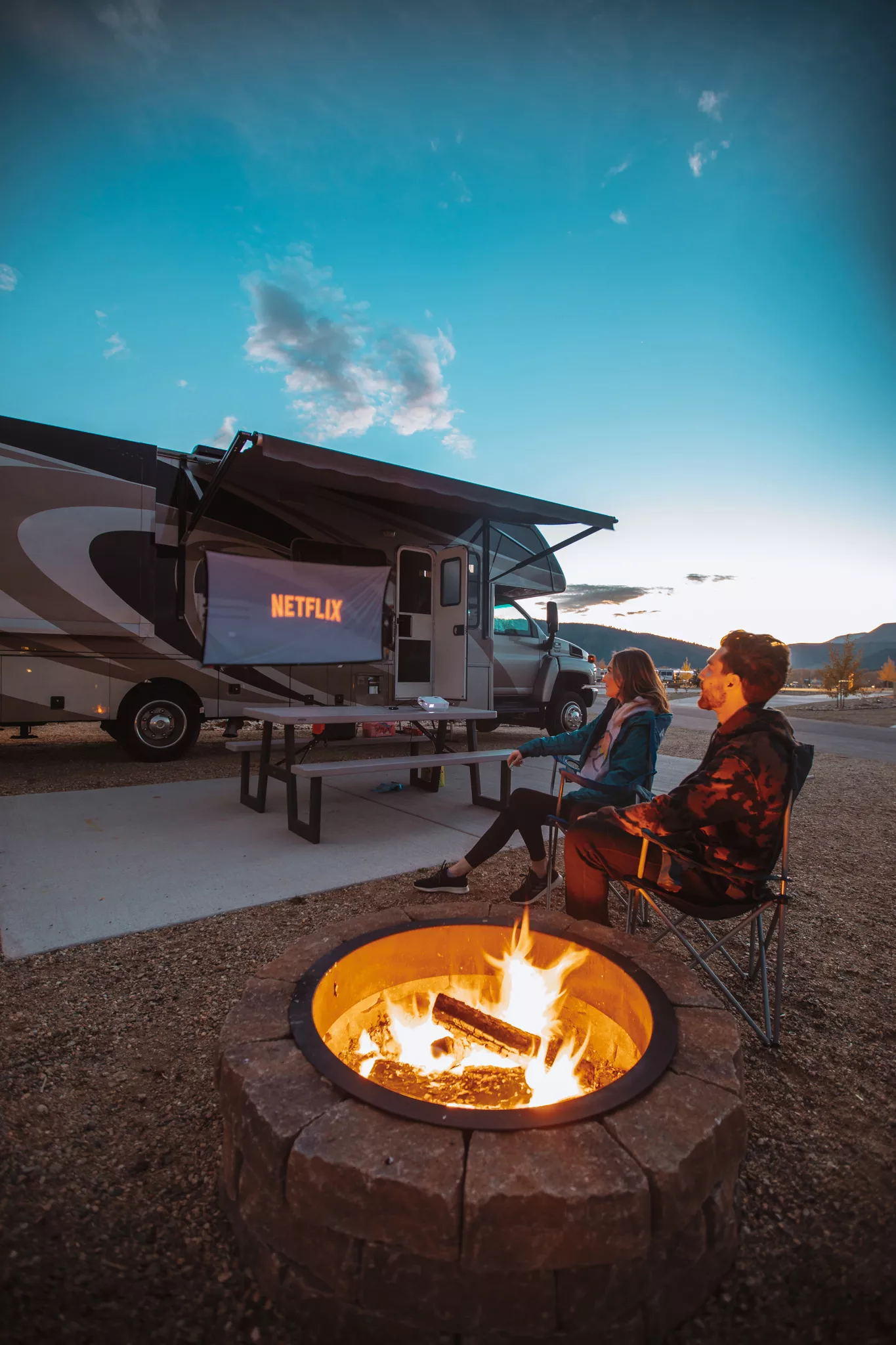 just married couple beginning honeymoon road trip in RV