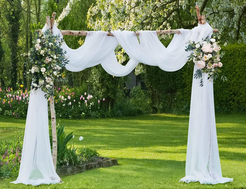 wedding fabric draping on arch