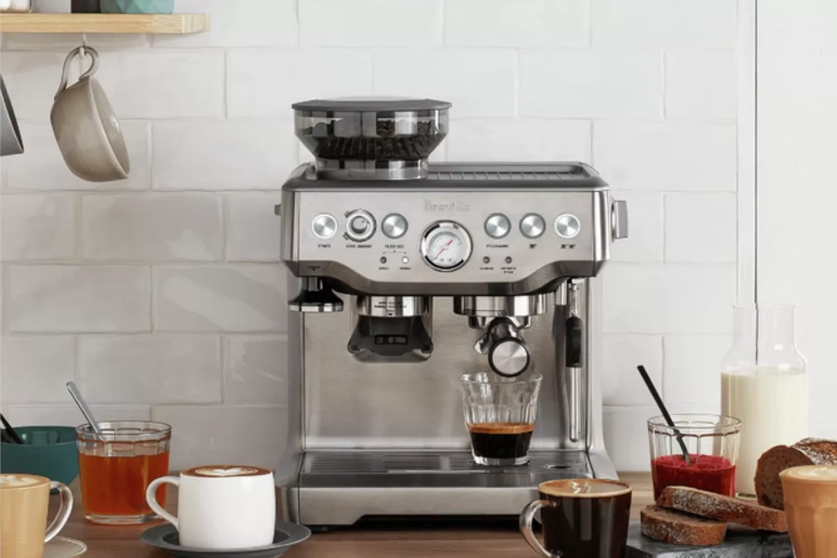 modern home essentials including coffee maker and mugs showing wedding gifts used in daily routines