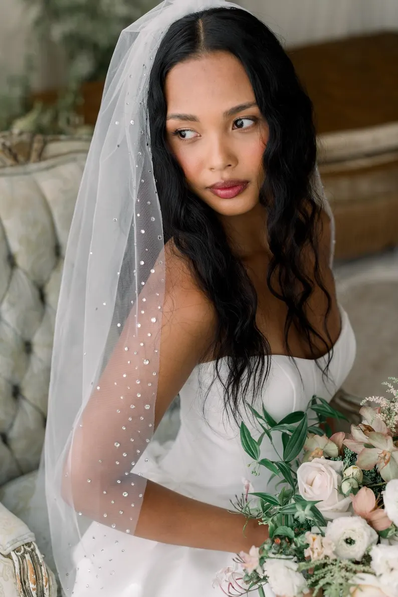 pearl wedding veil trend for 2026 with scattered pearls on soft tulle