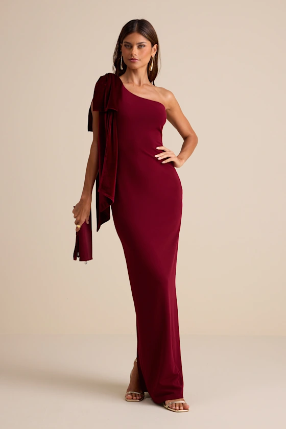 burgundy bridesmaid dress with one-shoulder neckline and maxi skirt