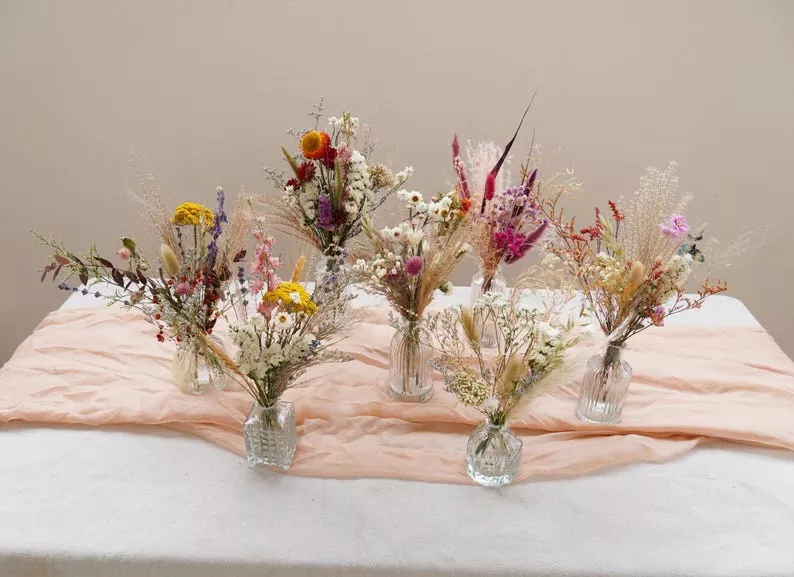 dried flower bouquets in bud vases