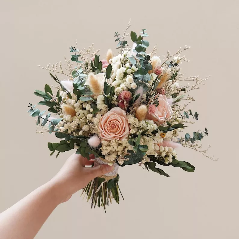 dried pink roses and grasses bouquet