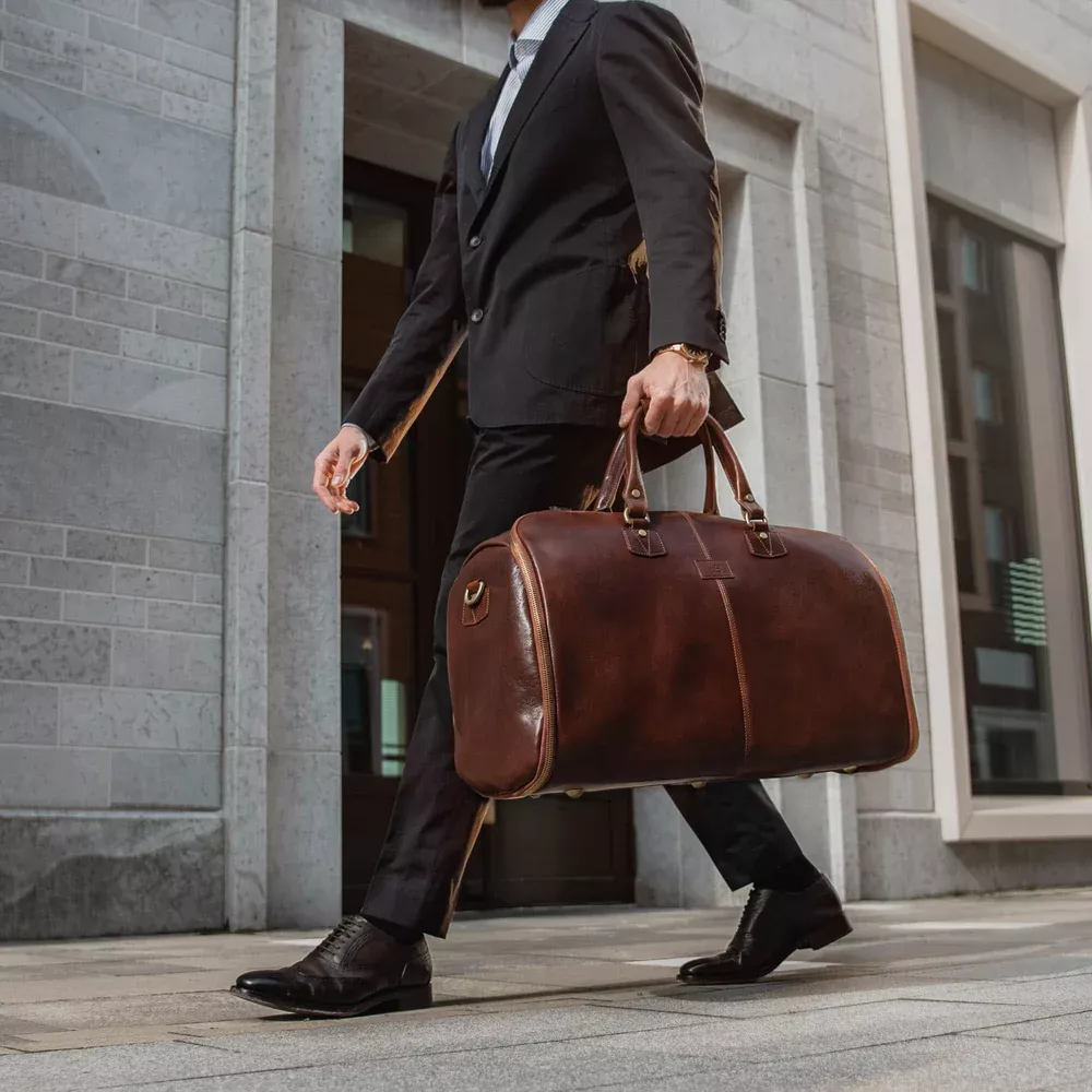 leather garment bag for traveling with groom's suit