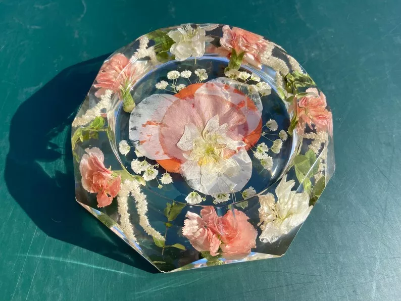 wedding flowers preserved in a resin jewelry dish