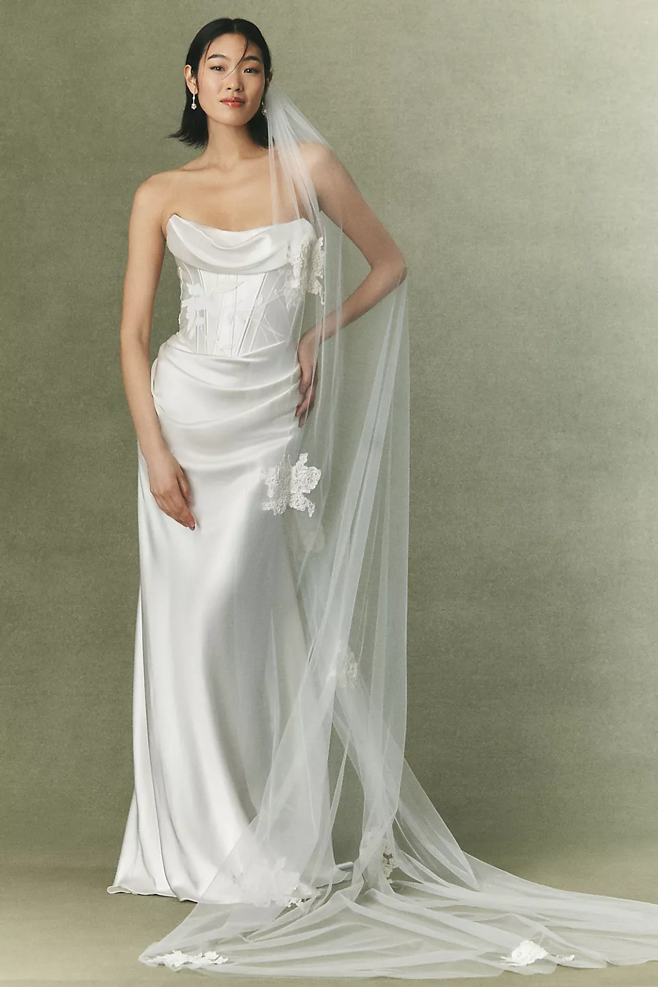 Divine Atelier Piper strapless silk wedding gown with draped corset and hand-painted floral appliqué