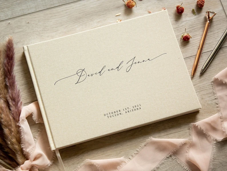 Personalized linen bound engagement party guest book