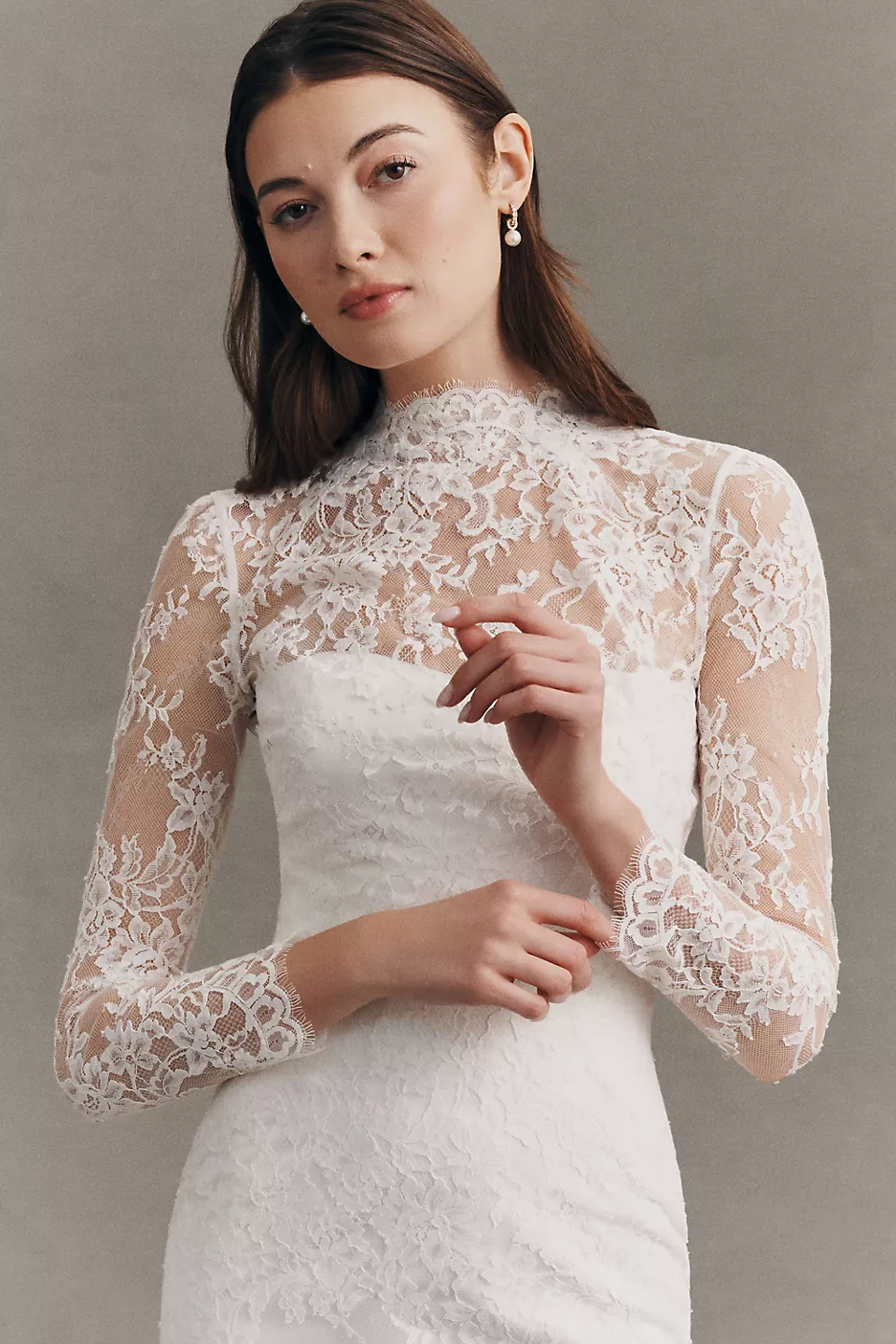 Floral lace bridal topper with sleeves by Pronovias