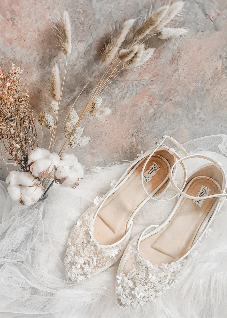 White pearl embellished wedding shoes for the bride