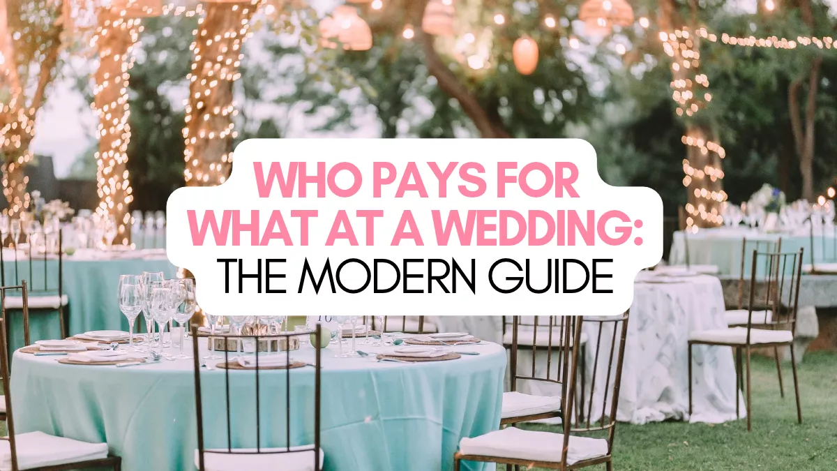 Wedding reception table with flowers, place settings, and wedding decorations