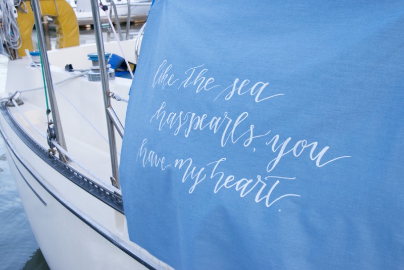 As the Sea Has Pearls, You Have My Heart | photo: christine glebov | linen calligraphy: a quaint soiree | via A Dreamy Seaside Wedding Shoot at Glen Cove Marina https://emmalinebride.com/real-weddings/seaside-wedding-glen-cove-marina/