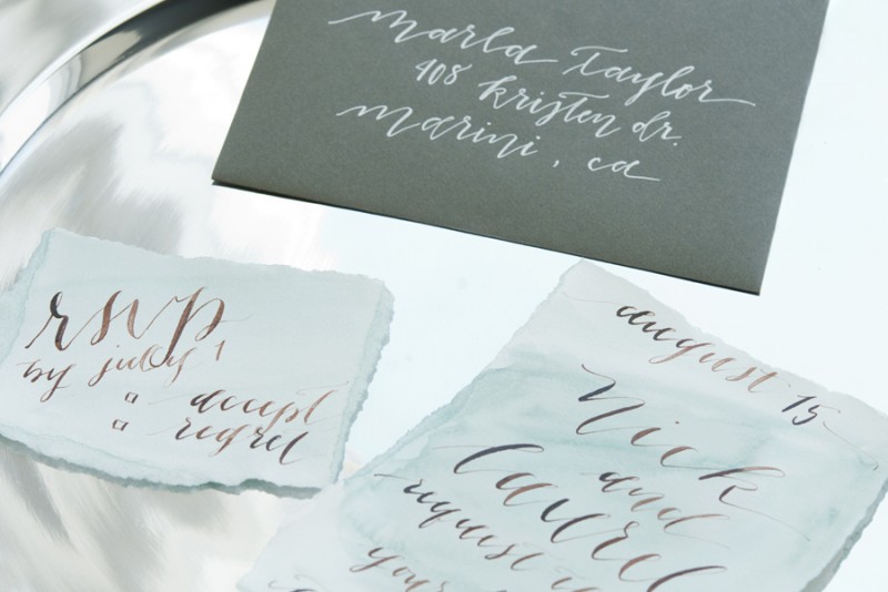 Calligraphy Invitations | photo: christine glebov | calligraphy: a quaint soiree | via A Dreamy Seaside Wedding Shoot at Glen Cove Marina https://emmalinebride.com/real-weddings/seaside-wedding-glen-cove-marina/