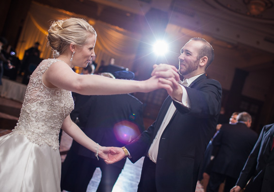bride and groom dance at reception at Crystal Tea Room Wedding - photo: Daniel Fugaciu Photography | via https://emmalinebride.com