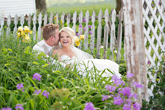 KimAnne Photography - iowa backyard wedding - bride-laughes-with-groom