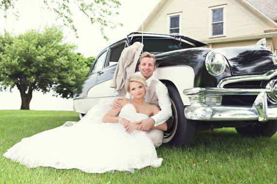 KimAnne Photography - iowa backyard wedding - bride-groom-pose-classic-car