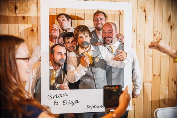Butler Photography LLC - groomsmen in photobooth