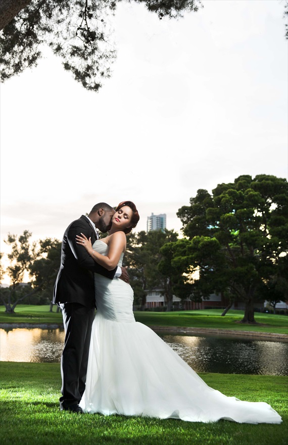Imagine Studios - groom kissing bride at intimate las vegas wedding