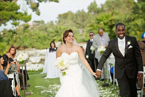Imagine Studios - bride and groom walk up the aisle at their las vegas wedding