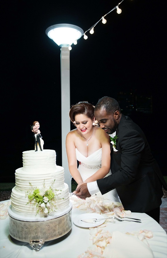 Imagine Studios - couple cuts the cake at las vegas wedding