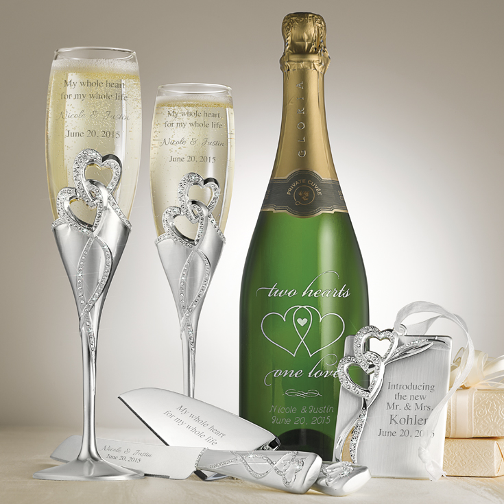 personalized champagne flutes from Things Remembered | via https://emmalinebride.com/2015-giveaway/personalized-champagne-flutes/