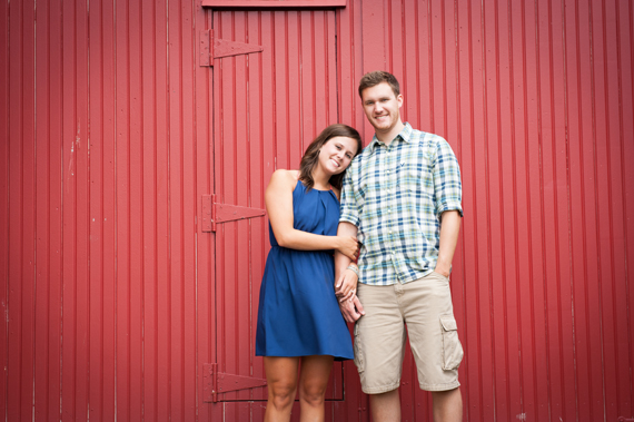 Scott Smith Photography - engagement shoot - couple in front of a red barn door