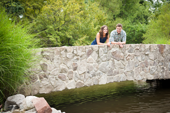 Scott Smith Photography - couple looking over stone bridge at Manor House engagement shoot at Prophecy Creek 