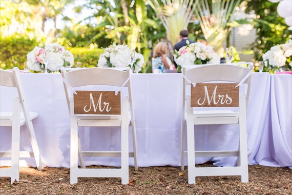 Filda Konec Photography - Hemingway House Wedding - mr. and mrs. chair signs for bride and groom's wedding