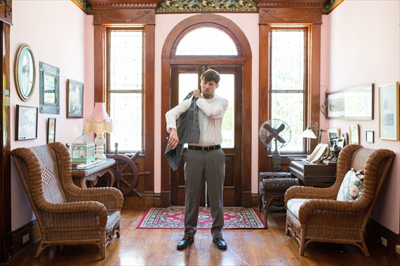 Filda Konec Photography - Hemingway House Wedding - groom gets ready and puts on suit jacket