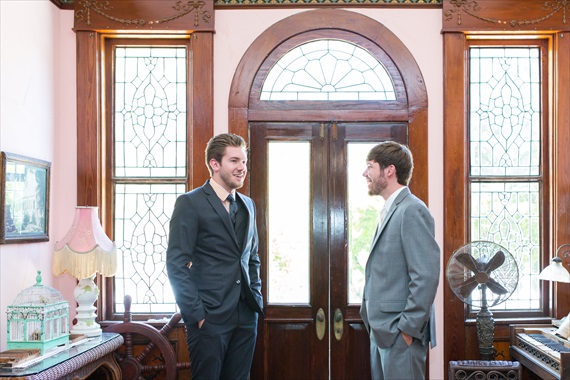 Filda Konec Photography - Hemingway House Wedding - groom talks with best man