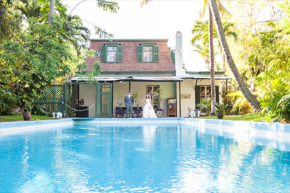 Filda Konec Photography - Hemingway House Wedding - bride and groom overlooking pool in key west