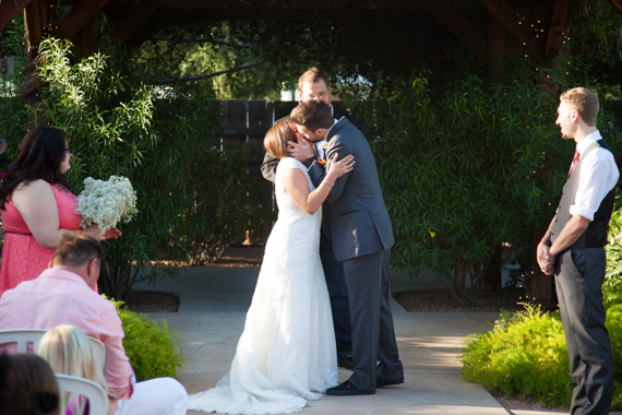 bride and groom kiss at Gilbert, Arizona wedding
