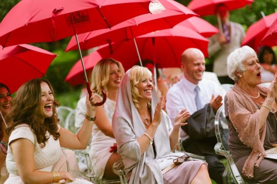 rain during ceremony | photo: adrian wood | real wedding in italy
