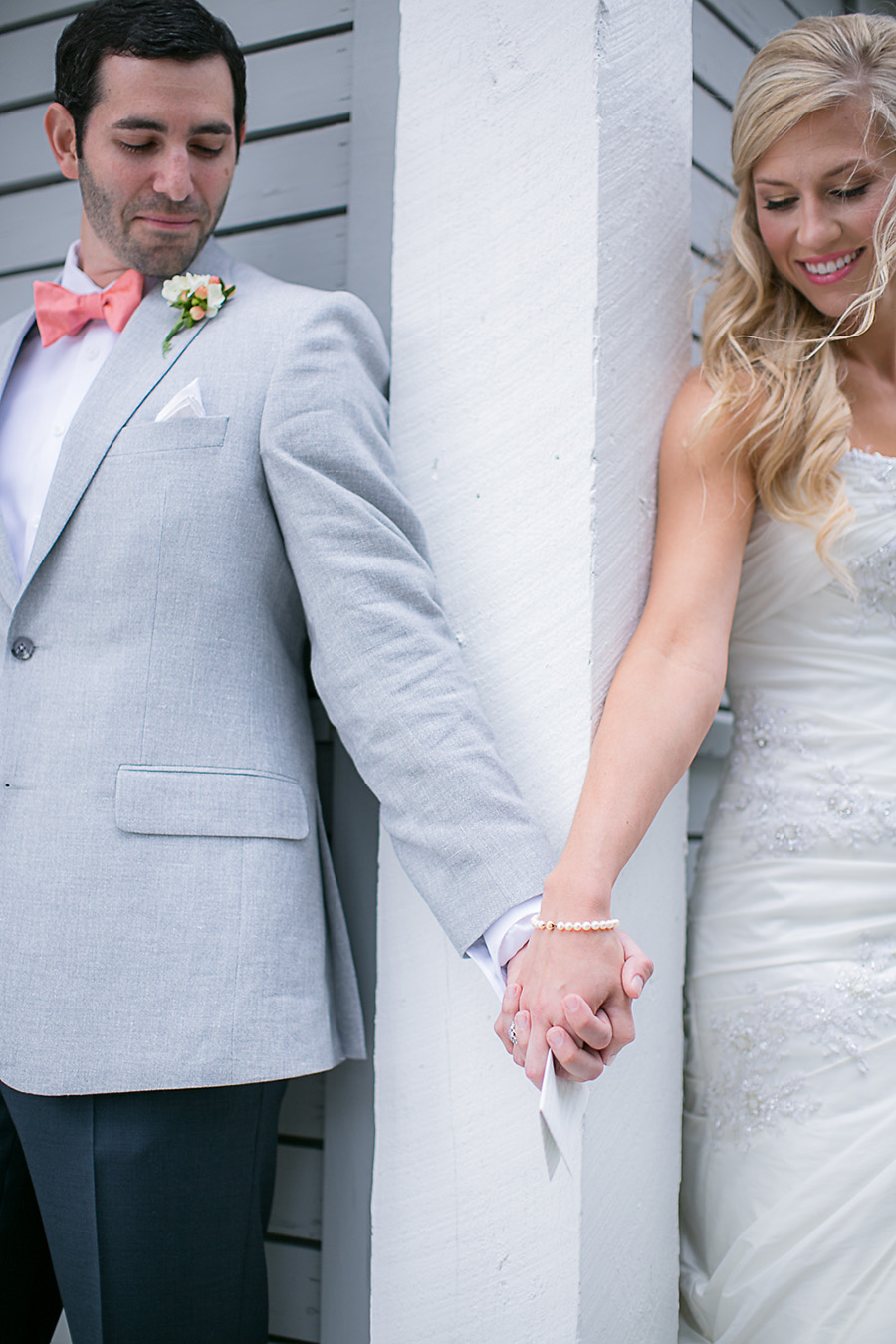 The Bride and Groom - Modern First Look Idea - Holding Hands - Bald Head Island Wedding - Photo by Eric Boneske