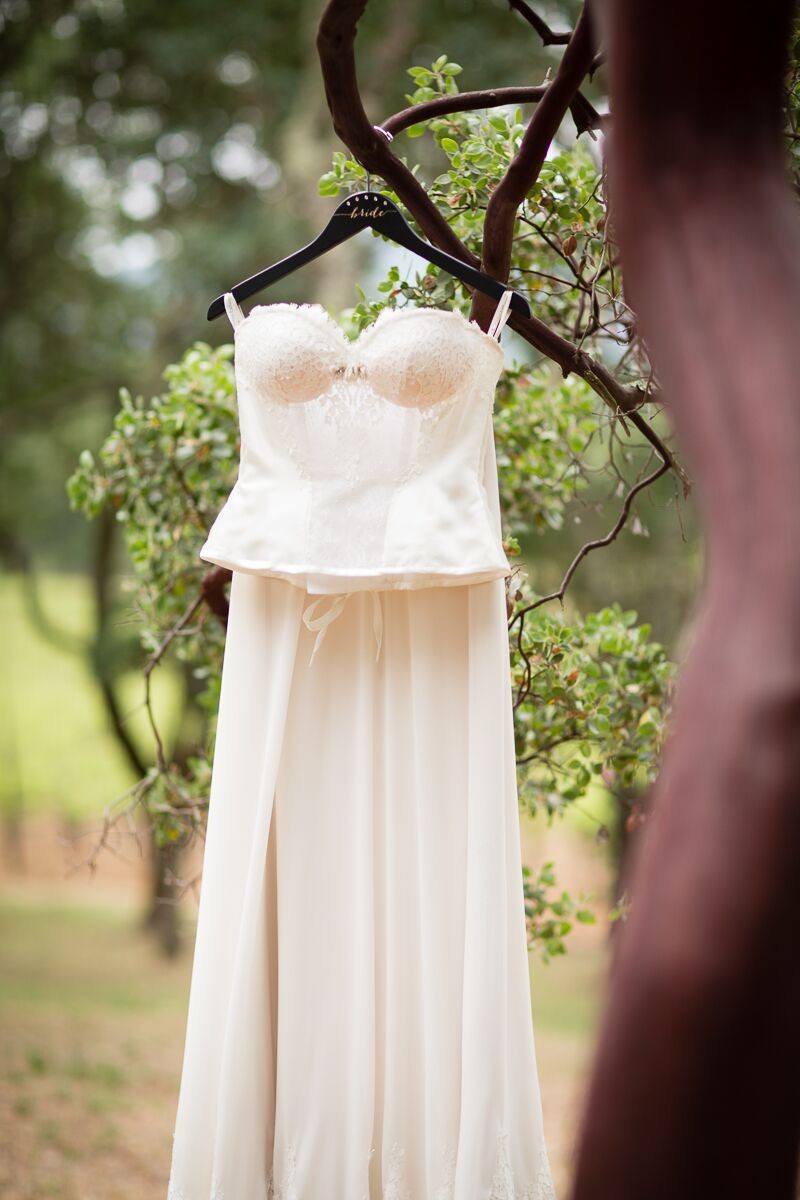 Winery Style Wedding Shoot - The Bride's Dress on Custom Hanger (photo: olivia smartt) https://emmalinebride.com/themes/winery-style-wedding/