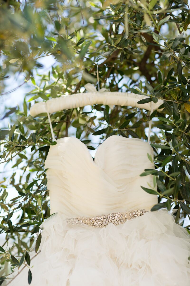 Winery Style Wedding Shoot - Wedding Gown on Satin Hanger (photo: olivia smartt) https://emmalinebride.com/themes/winery-style-wedding/