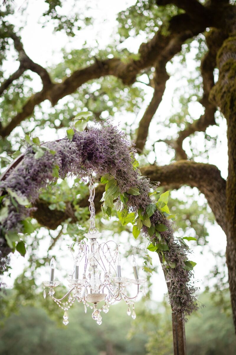 Winery Style Wedding Shoot - lavender wedding arch with chandelier (photo: olivia smartt) https://emmalinebride.com/themes/winery-style-wedding/