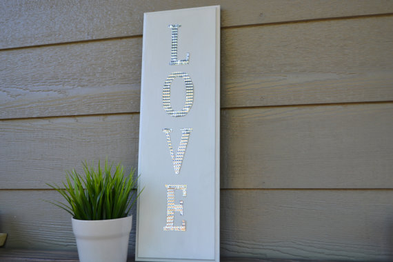 aluminum love sign via 27 Amazing Anniversary Gifts by Year https://emmalinebride.com/gifts/anniversary-gifts-by-year/