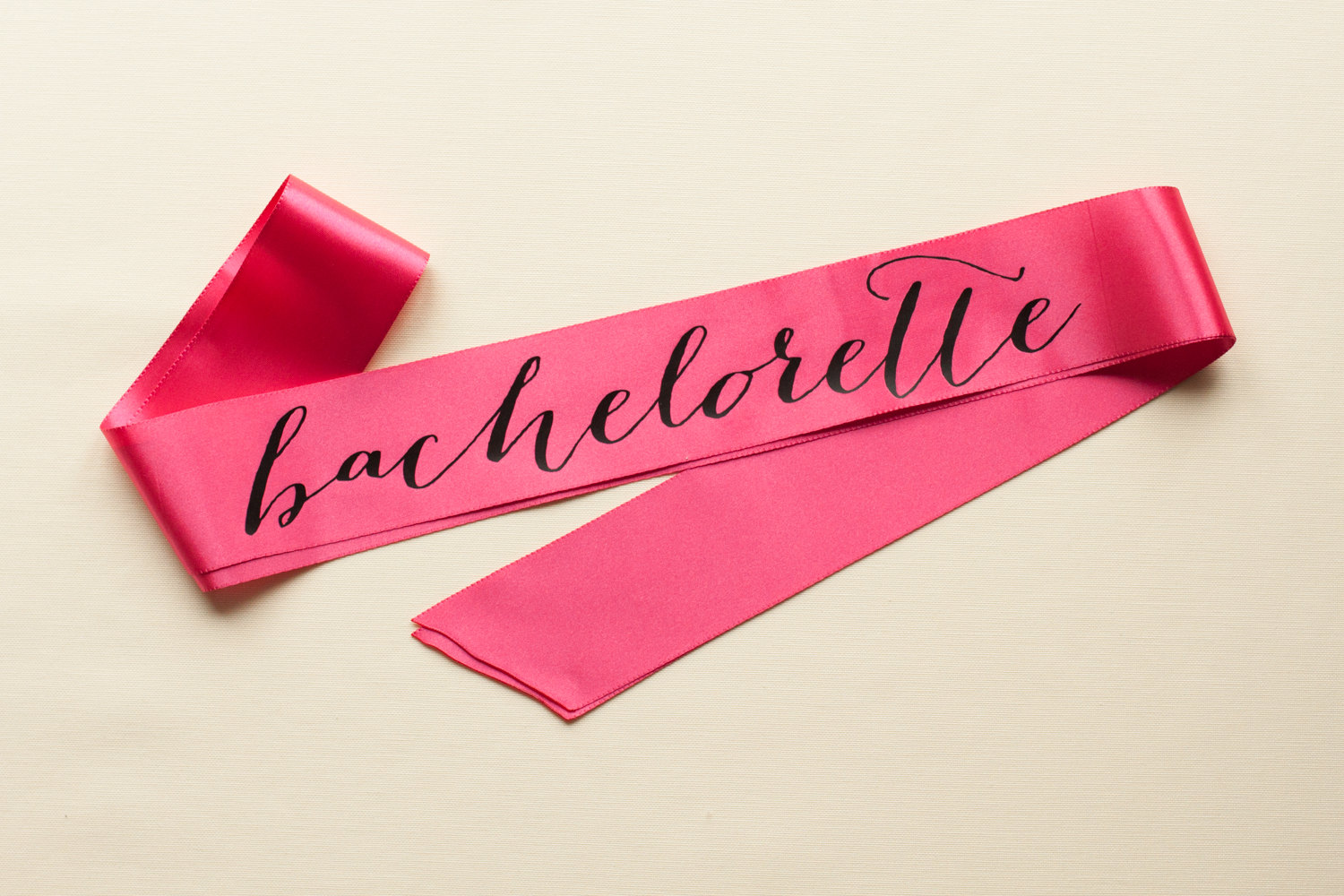 bachelorette party sash | fun bachelorette party ideas | https://emmalinebride.com/planning/fun-bachelorette-party-ideas/
